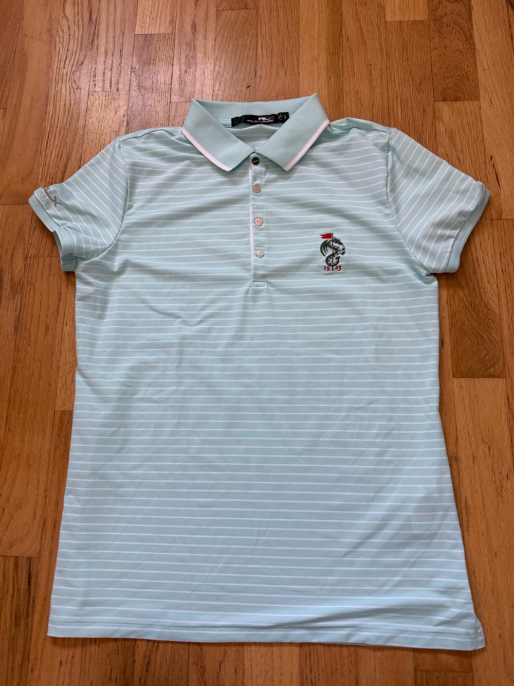 MONTEREY PENINSULA COUNTRY CLUB (MPCC) women’s light blue striped RLX polo Small